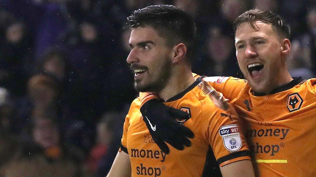 Ruben Neves and Barry Douglas celebrate a goal for Wolves