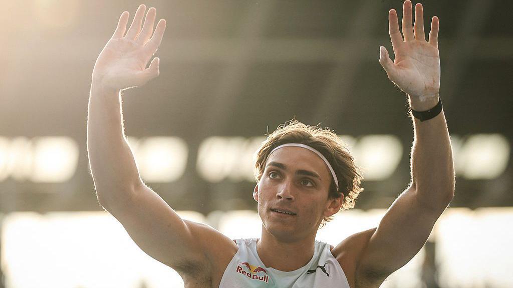 Sweden's Armand Duplantis celebrates after winning the men's Pole Vault 