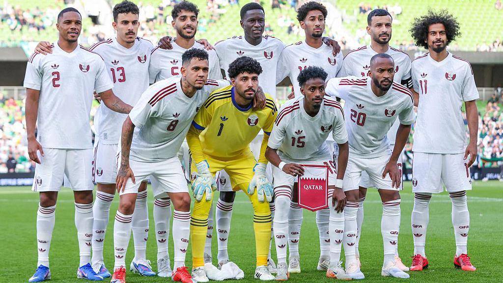 Qatar football team posing for team picture