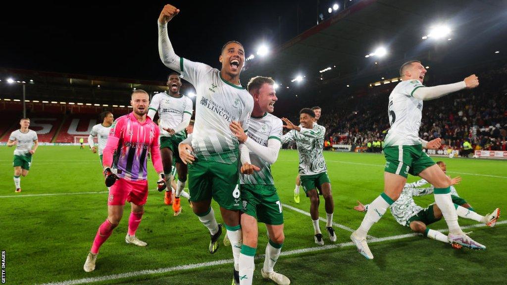 Lincoln City players celebrate