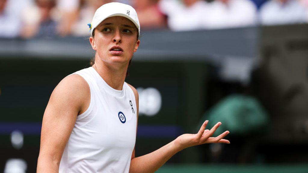 Iga Swiatek on court at Wimbledon