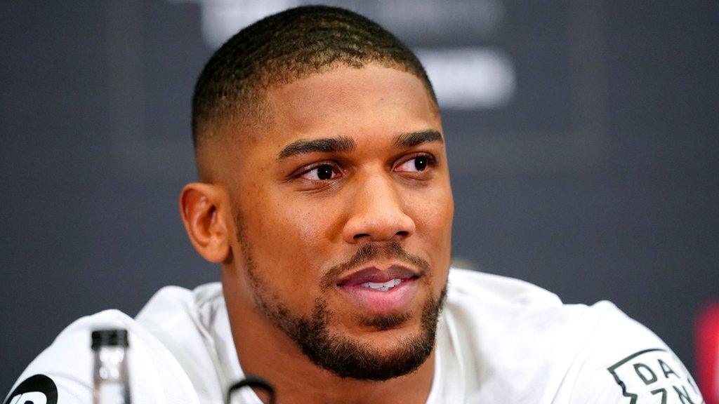 Anthony Joshua at a news conference speaking