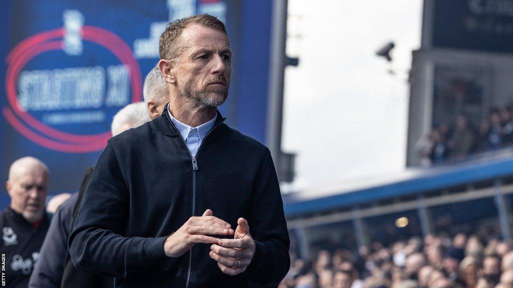 Birmingham City interim manager Gary Rowett walks to his seat in the dugout