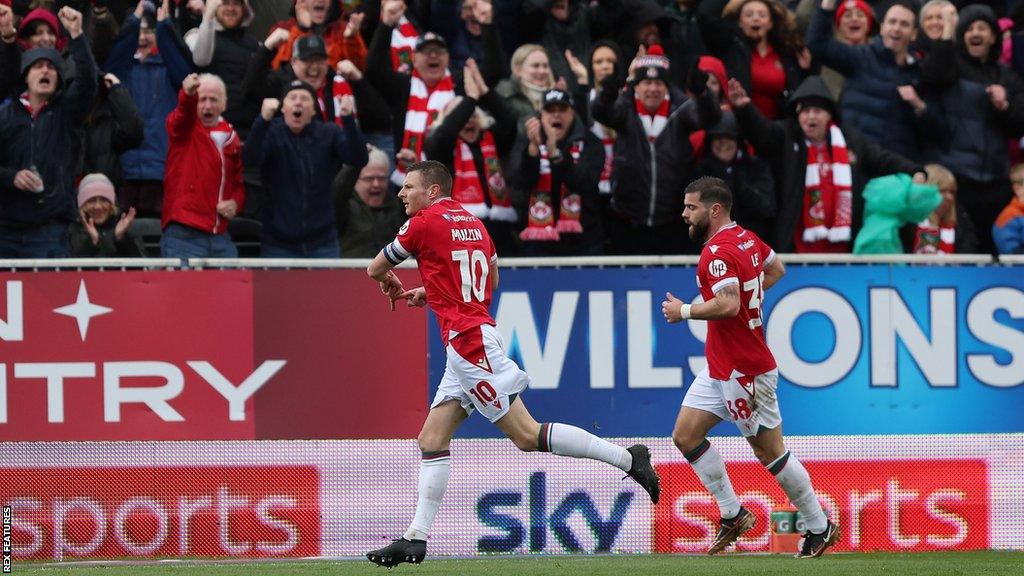 Wrexham's Paul Mullin celebrates scoring a goal