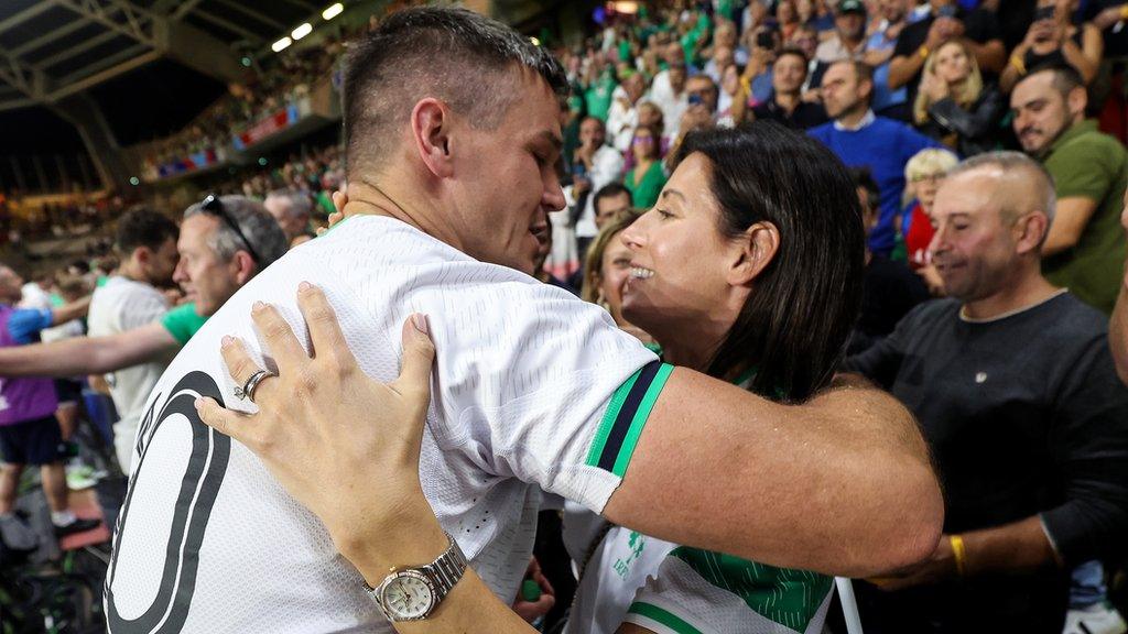 Johnny Sexton celebrates the achievement with his wife Laura after the game