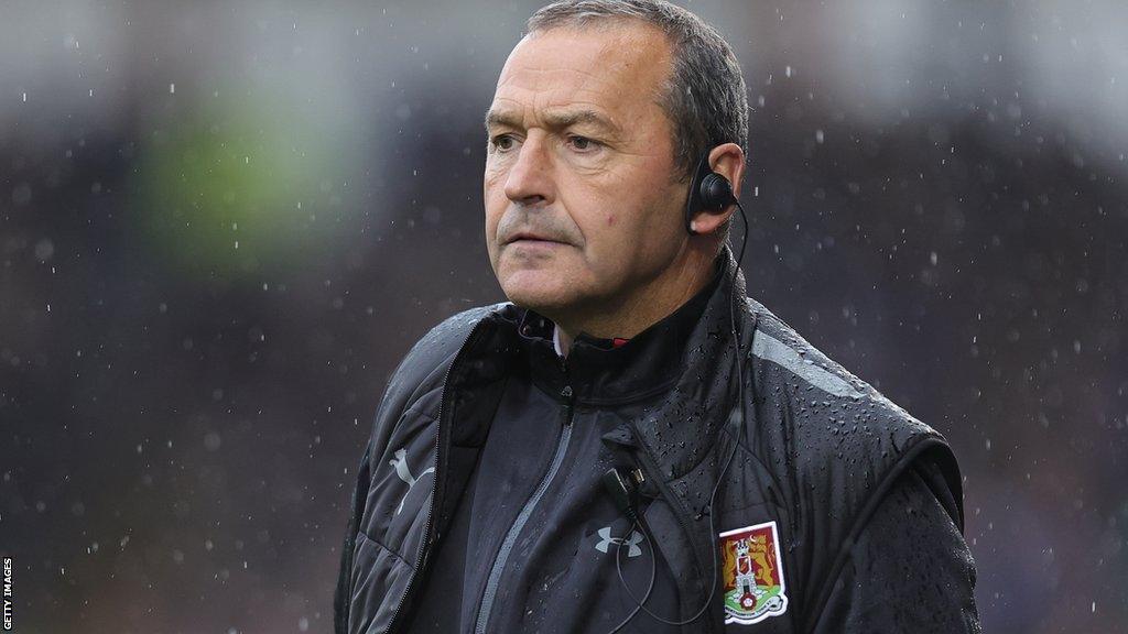 Colin Calderwood watches Northampton Town