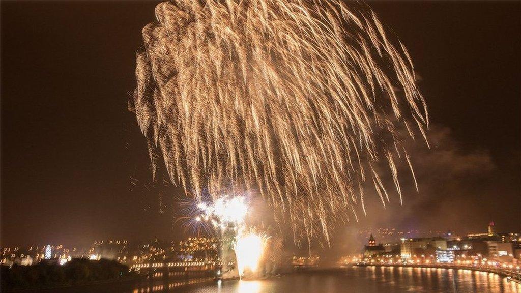 Crowds lined the city's quay to watch the fireworks display