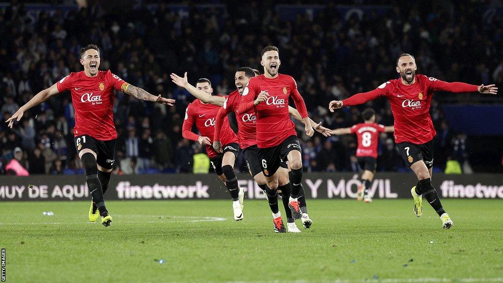 Mallorca players celebrate after their penalty shootout win over Real Sociedad