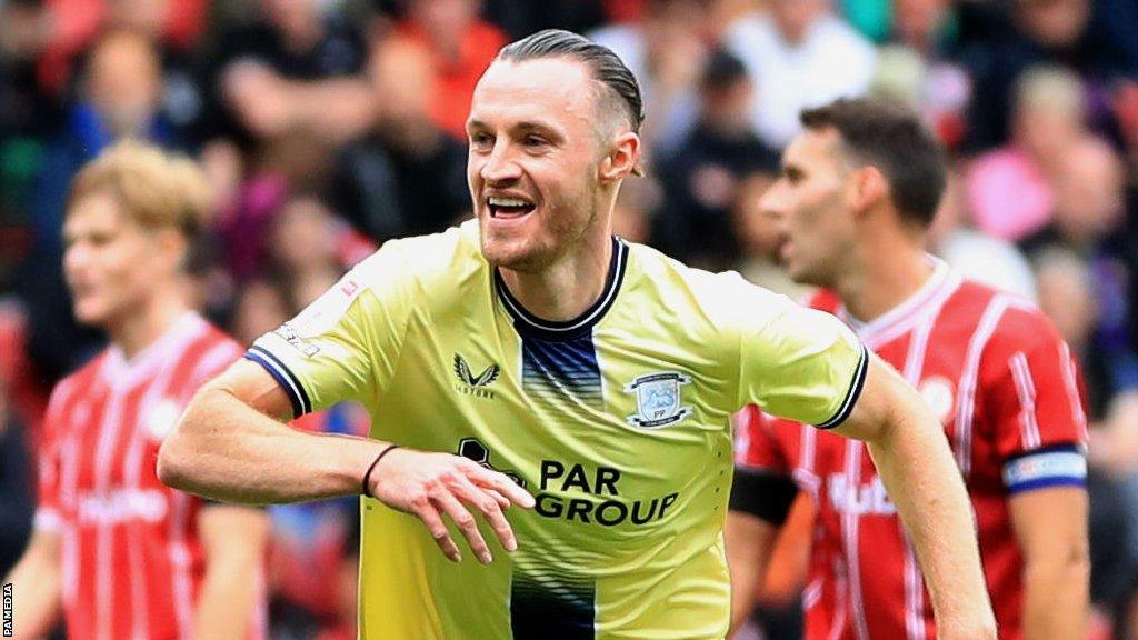 Will Keane celebrates a goal for Bristol City