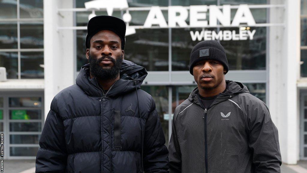 Joshua Buatsi and Dan Azeez pose outside the OVO Arena in Wembley