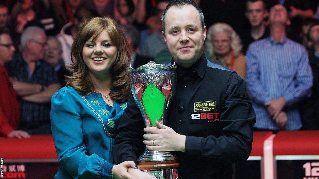 John Higgins and his wife Denise celebrate his trophy win at Telford in December 2010