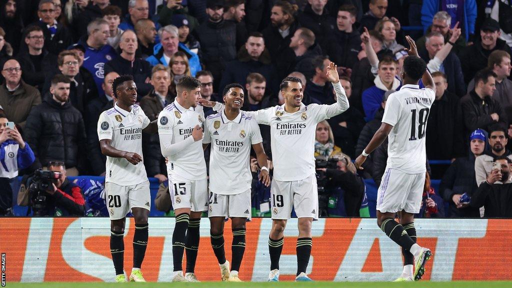 Rodrygo (centre) celebrates his second goal at Chelsea with Real Madrid team-mates