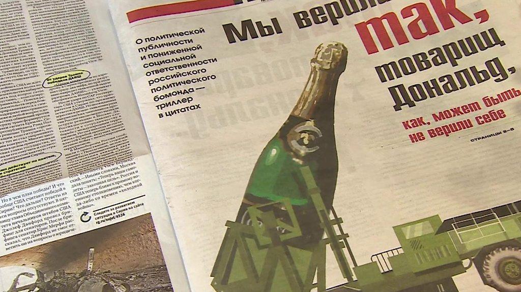 Drawing of missile launcher carrying giant bottle of champagne instead of a missile.