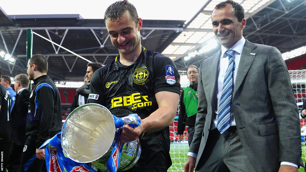 Shaun Maloney (left) celebrates Wigan's FA Cup triumph in 2013 with boss Roberto Martinez