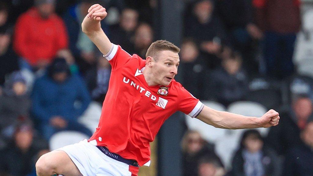 Paul Mullin in action for Wrexham against Grimsby Town