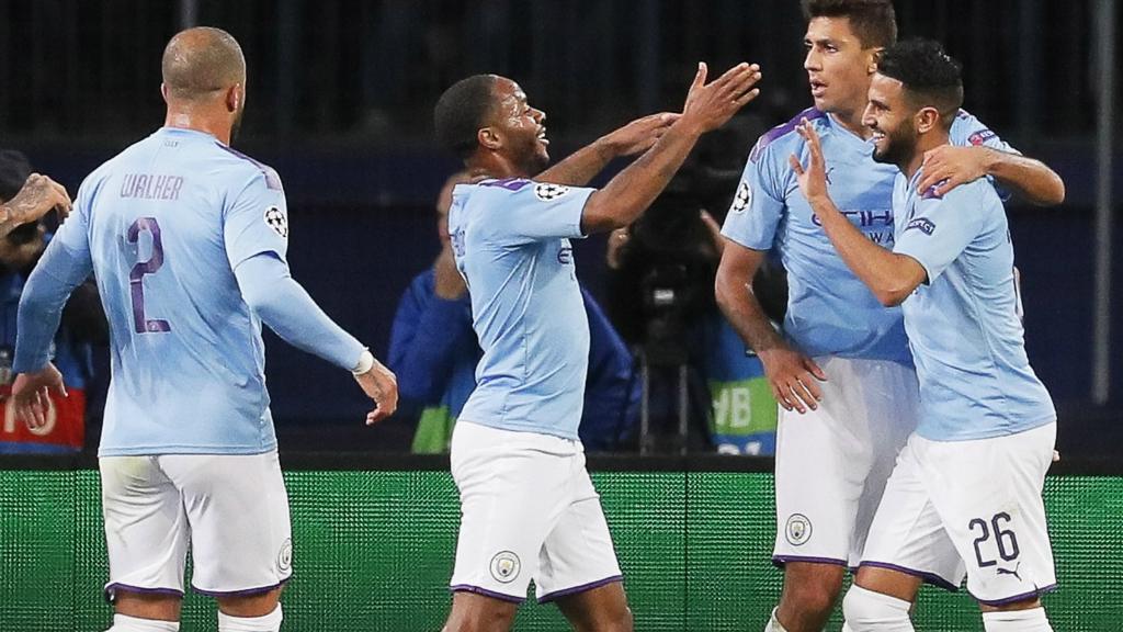 Raheem Sterling, Ilkay Gundogan and Riyad Mahrez celebrate