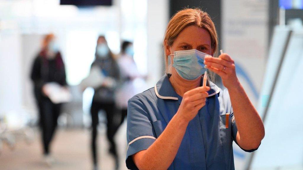 Nurse with vaccine