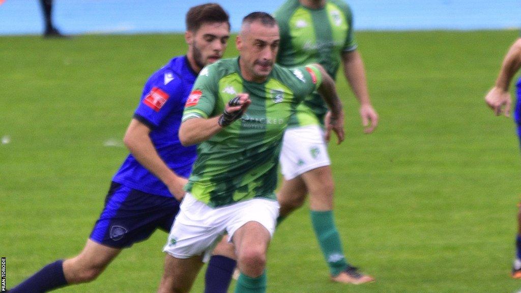 Jamie Dodd in action for Guernsey FC