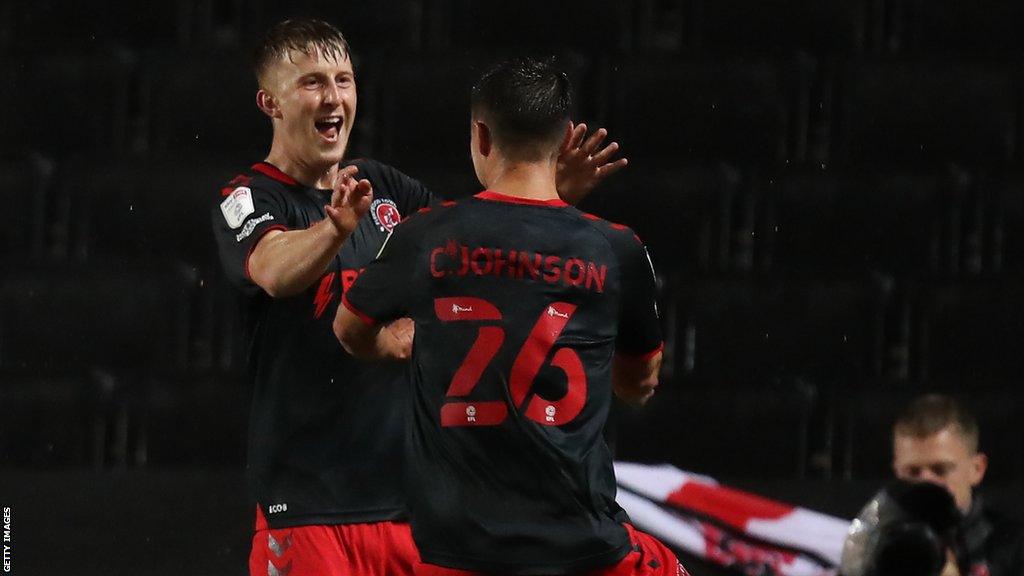 Ged Garner celebrates with team-mate Callum Johnson