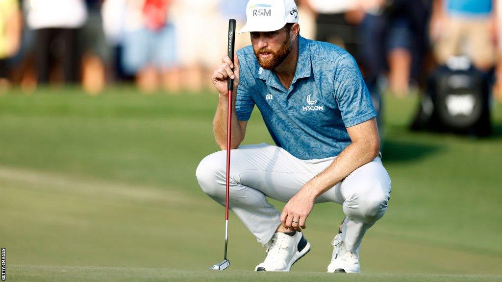 Chris Kirk lining up a putt at Honda Classic