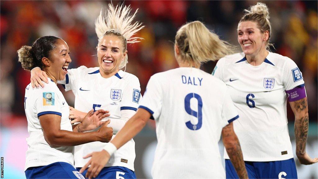 Lauren James of England celebrates with team mates at the World Cup