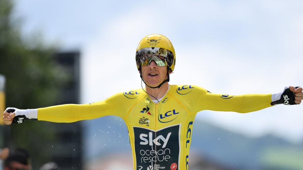 Geraint Thomas celebrates on the finish line of stage 20 of the Tour de France