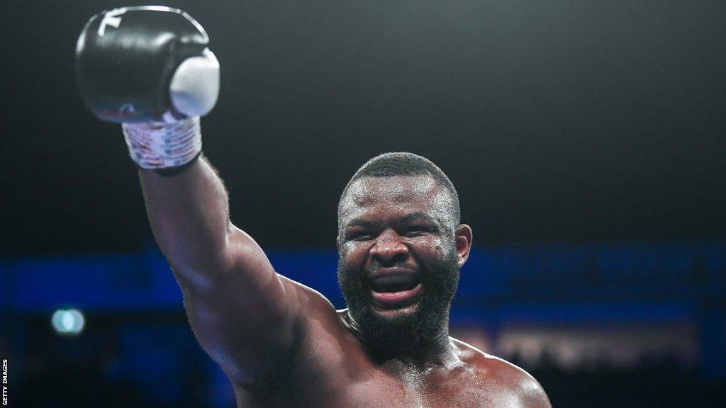 Martin Bakole celebrating