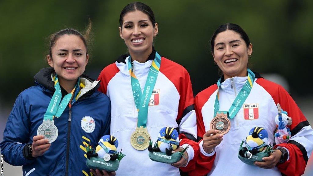 Ecuador's Glenda Estefania Morejon, Peru's Gabriela Kimberly Garcia and Peru's Evelyn Carla Inga pose with their medals