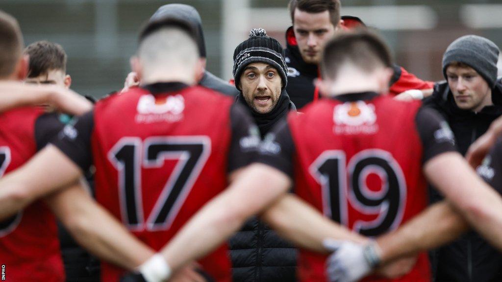 Conor Laverty talks to the Down players prior to the Dr McKenna Cup game against Ulster champions Derry in early January