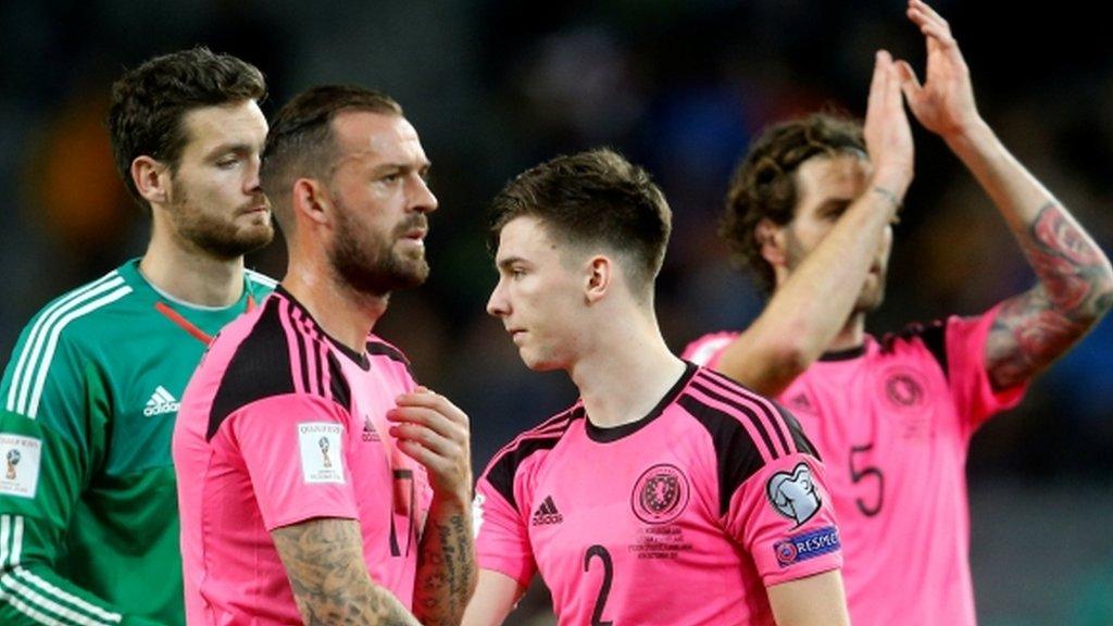 Scotland players look dejected after their draw in Slovenia