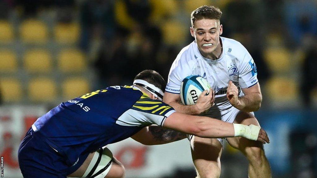 Rob Russell of Leinster is tackled by Davide Ruggeri of Zebre