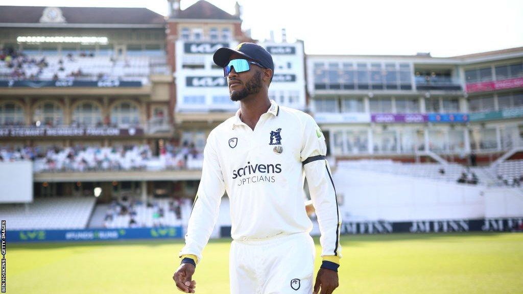 Kraigg Brathwaite walks out at The Oval to make his Warwickshire debut - little over after flying in