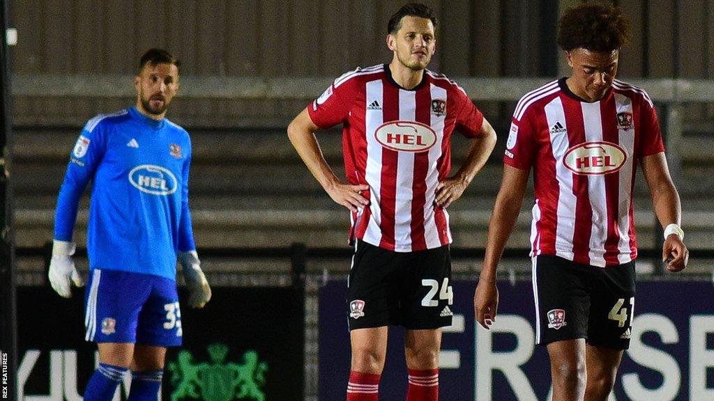 Dejected Exeter players after their 9-0 loss to Reading