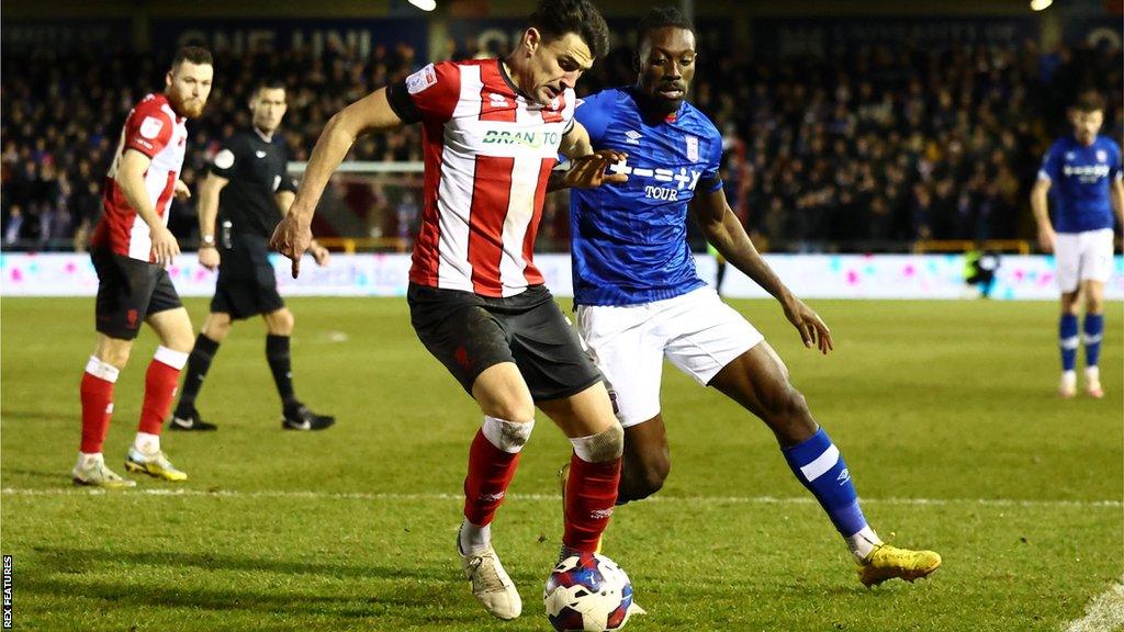 Portsmouth have signed defender Regan Poole following his departure from Lincoln City.