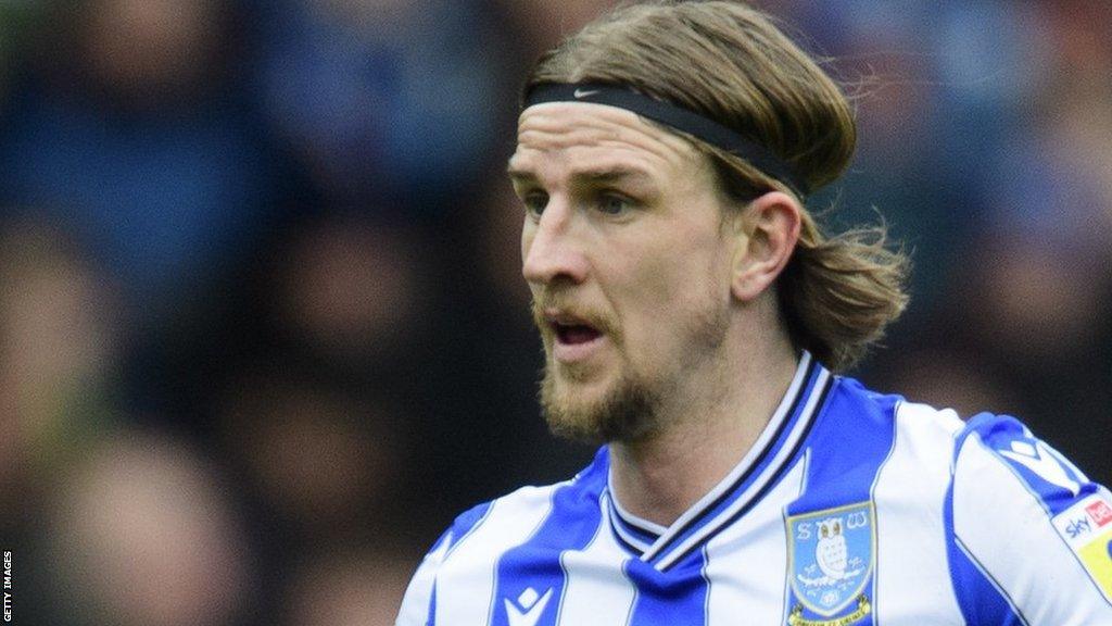 Aden Flint awaits an attack while on loan at Sheffield Wednesday