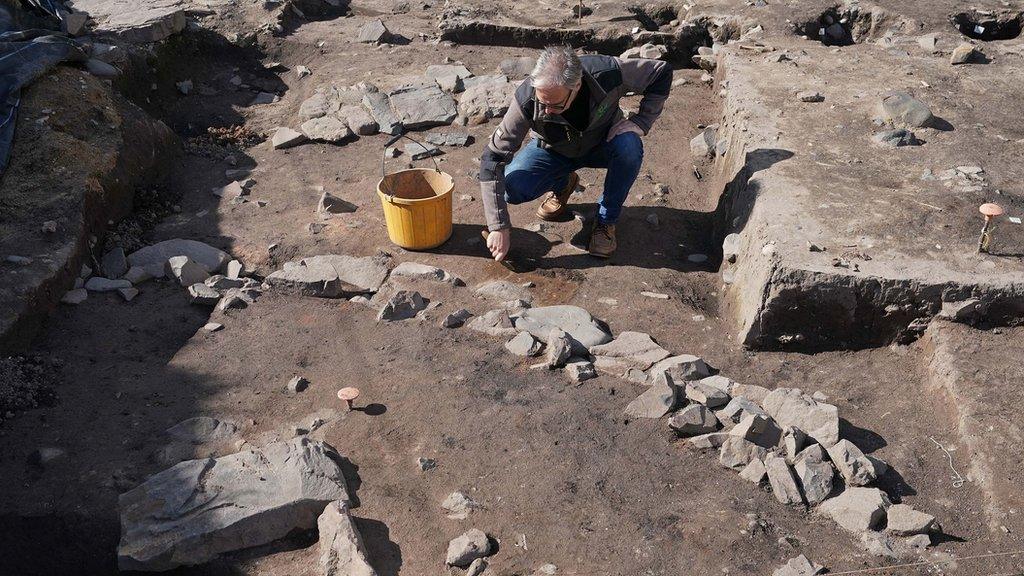 Ancient roundhouse discovered at Bamburgh Castle