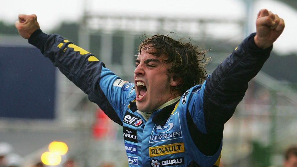 Fernando Alonso celebrates winning his first championship in 2005