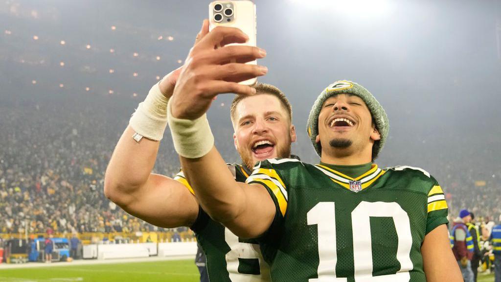 Jordan Love takes a selfie after a Green Bay Packers game