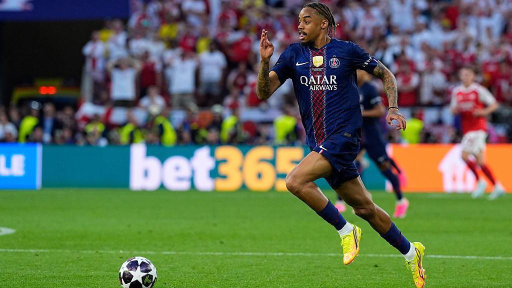 Bradley Barcola dribbles the ball forward at pace while playing for PSG in the Champions League final