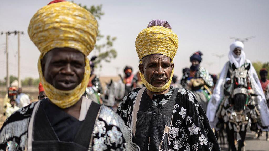 Members of the royal guard parade during the Durbar horse procession in Dutse on March 31, 2025