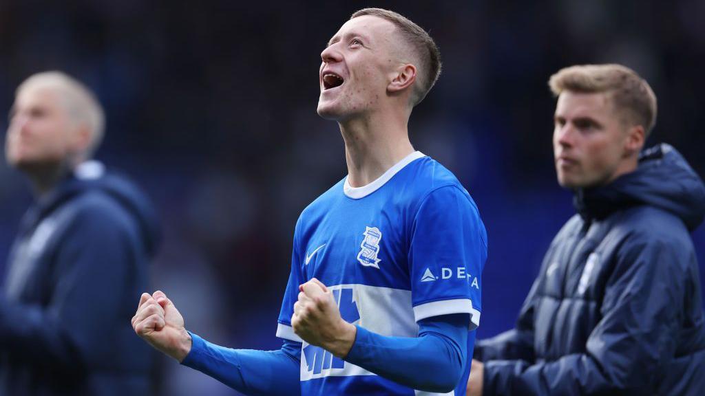 Jay Stansfield shouts in celebration with a double-fist punch of the air