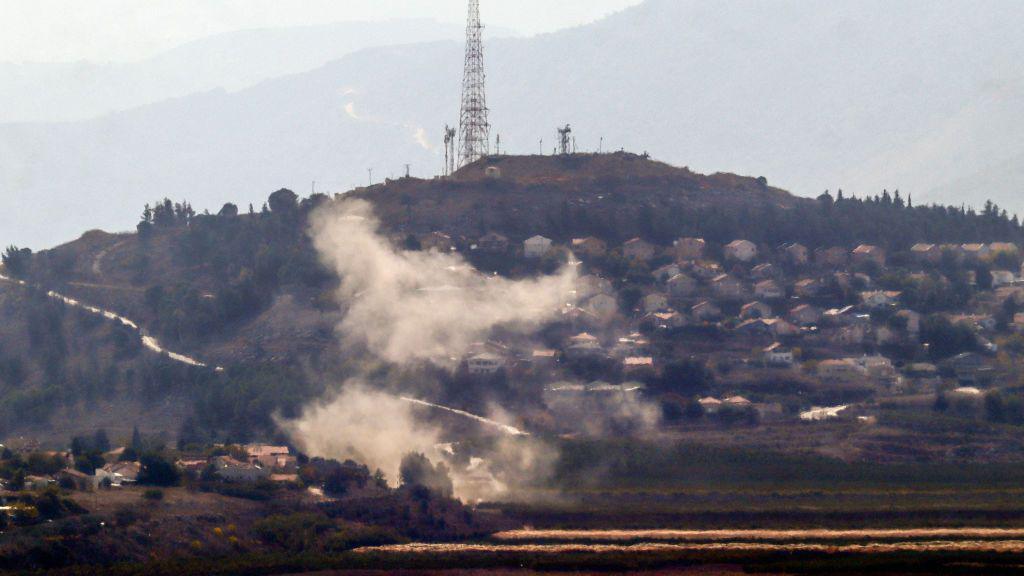 Smoke rises from the northern Israeli town of Metula following a Hezbollah rocket attack, as seen from the southern Lebanese area of Marjayoun (31 October 2024)