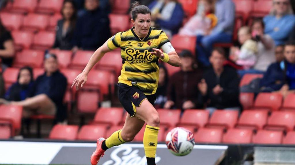 Helen Ward chases the ball for Watford during their WSL match against Liverpool