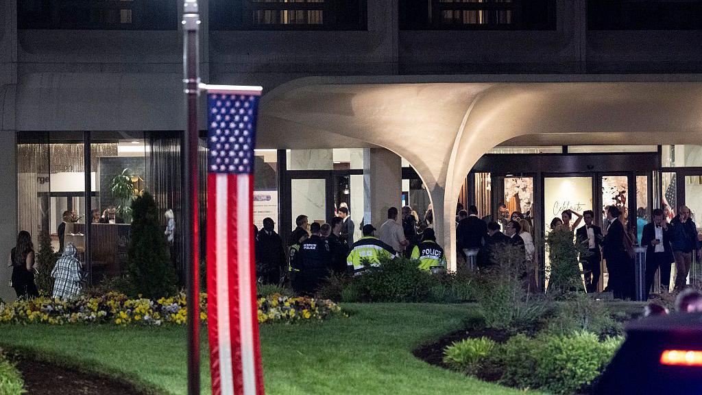 Guests outside the hotel, where the event had been taking place.