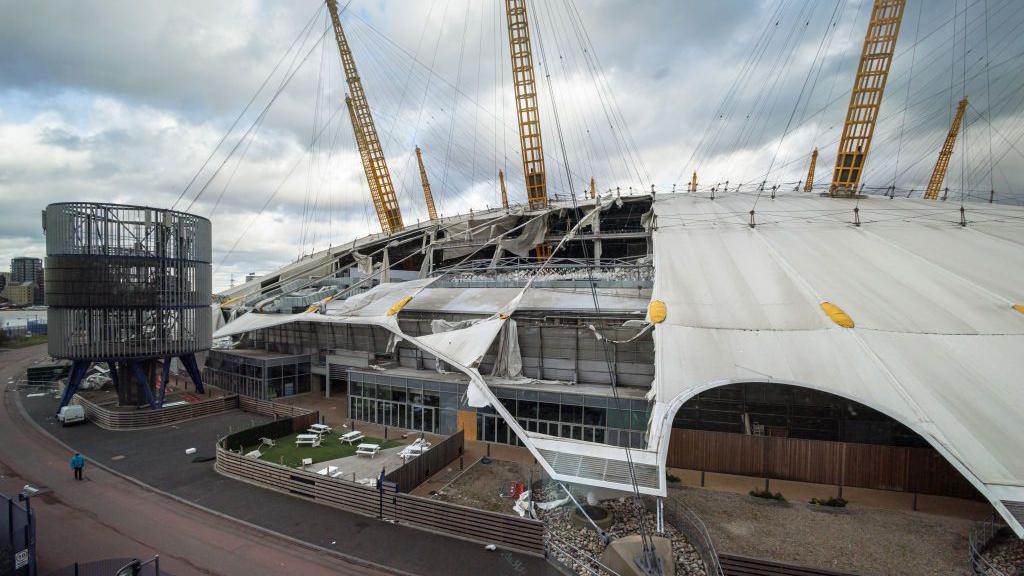 Damage is seen on the roof of the O2 Arena, formerly known as the Millennium Dome