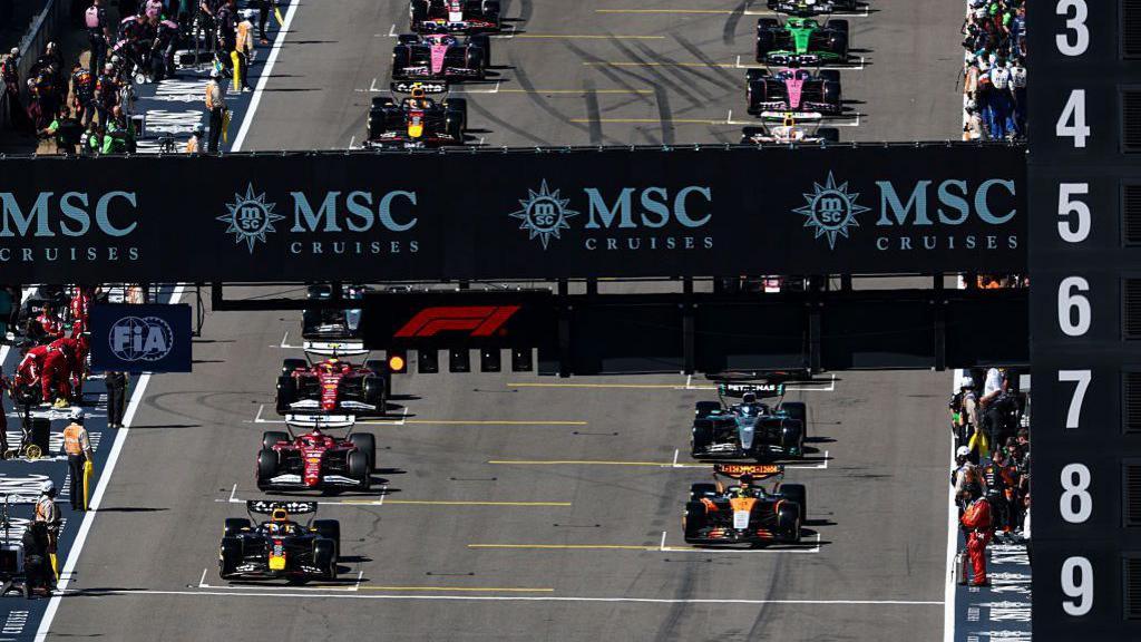 The cars lined up on the grid immediately before the start of the United States Grand Prix