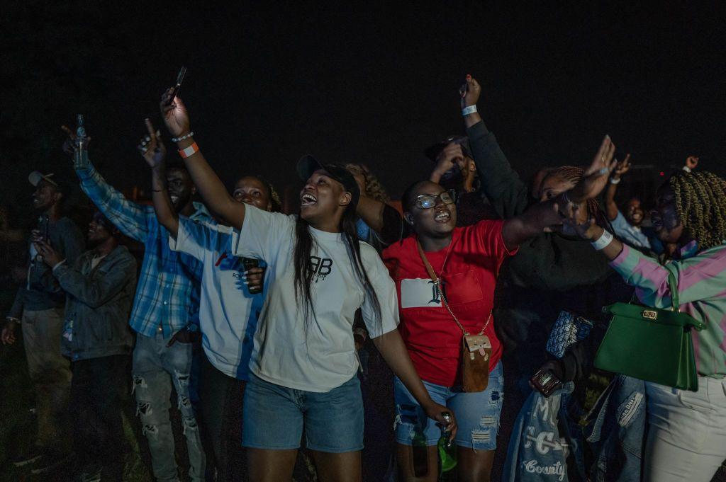 Fans wait for the beginning of the then cancelled concert by Congolese artist Fally Ipupa at the Ihusi Village in Goma on 16 August.