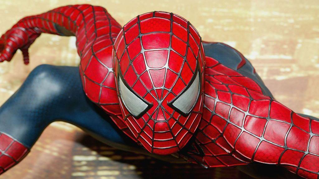 A waxwork version Spider-Man in a crouching pose in his red and blue costume