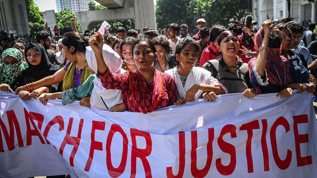 People shout slogans during a protest march outside the High Court building demanding justice for the victims arrested and killed in the recent countrywide violence in Dhaka on July 31, 2024