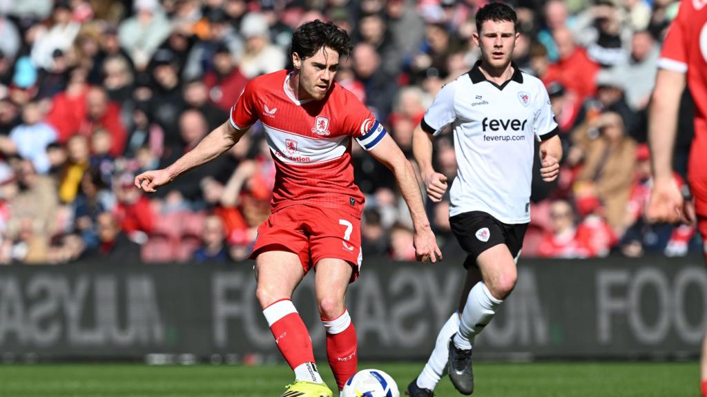 Middlesbrough's Hayden Hackney plays a pass forward